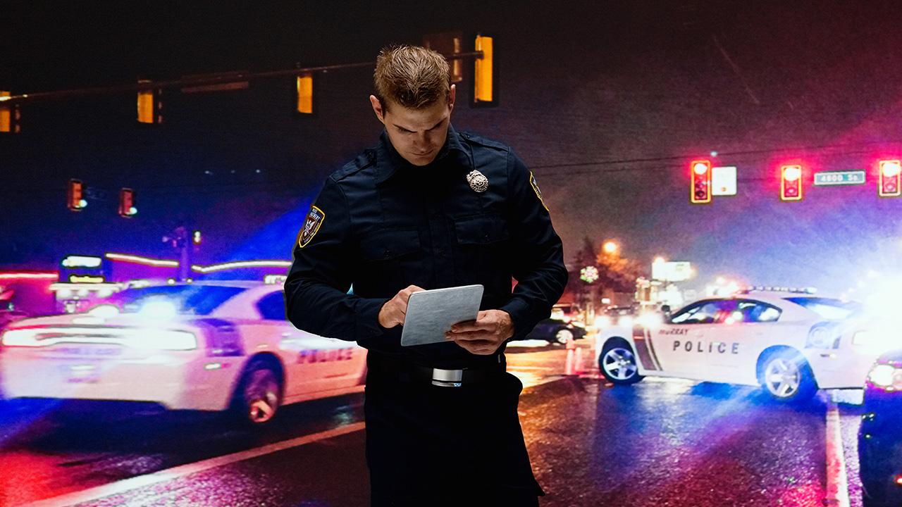 Police officer using a connected device